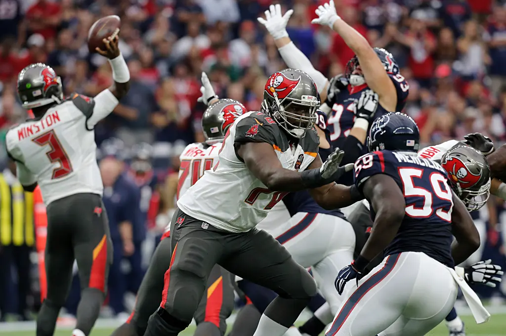 Gosder Cherilus blocks Whitney Mercilus